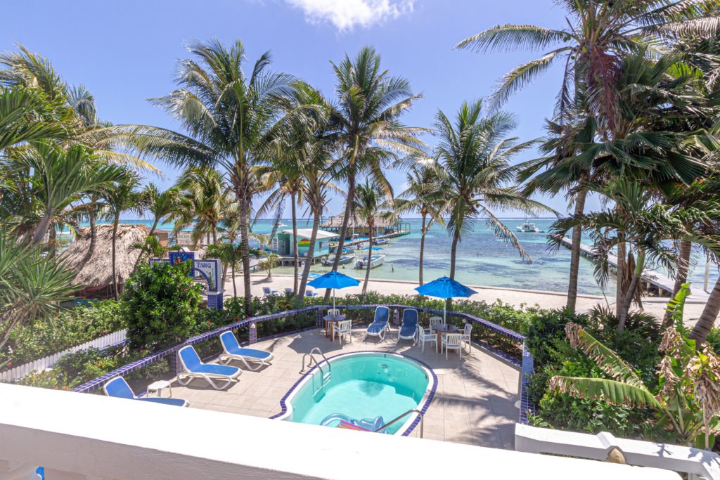 Stay at the Best Hotel in San Pedro, Belize 1 View of the pool and beach from our #1-rated San Pedro, Belize Hotel