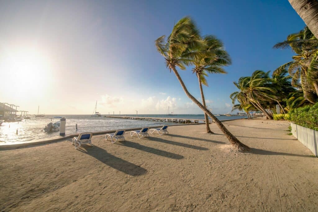 San Pedro Belize Hotel Sitting on the beach in front of our hotel is one of the best things to do in San Pedro, Belize