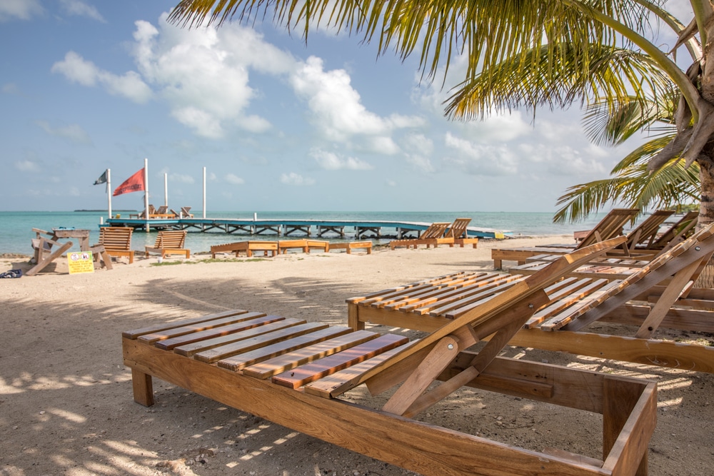 Chairs lined up on Secret Beach in Belize